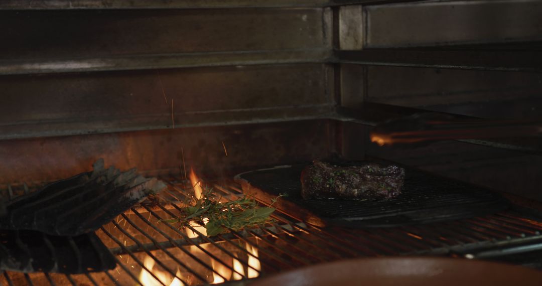 Grilling Juicy Steak on Open Flame in Industrial Kitchen - Free Images, Stock Photos and Pictures on Pikwizard.com