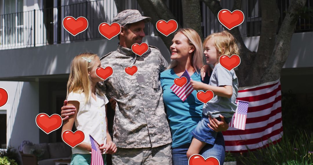 Returning Soldier Embracing Family with American Flags