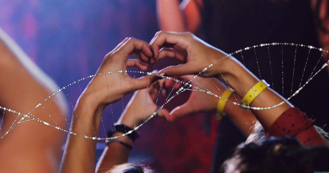 Celebrating Unity with Heart-Shaped Hands at Concert