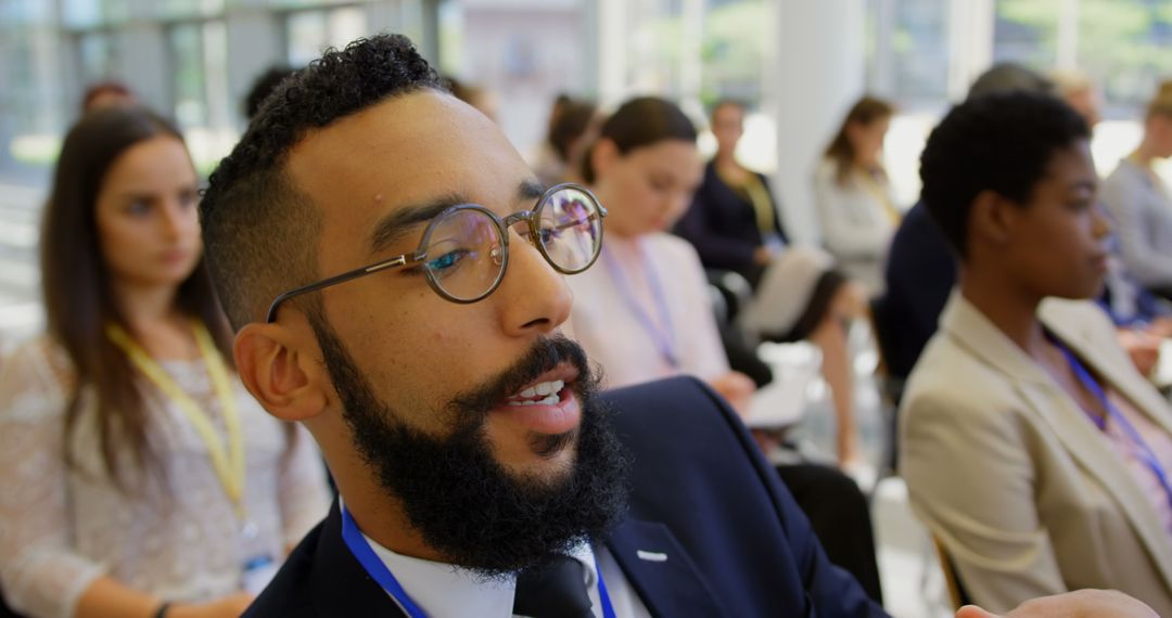 Young professionals engaged at conference seminar