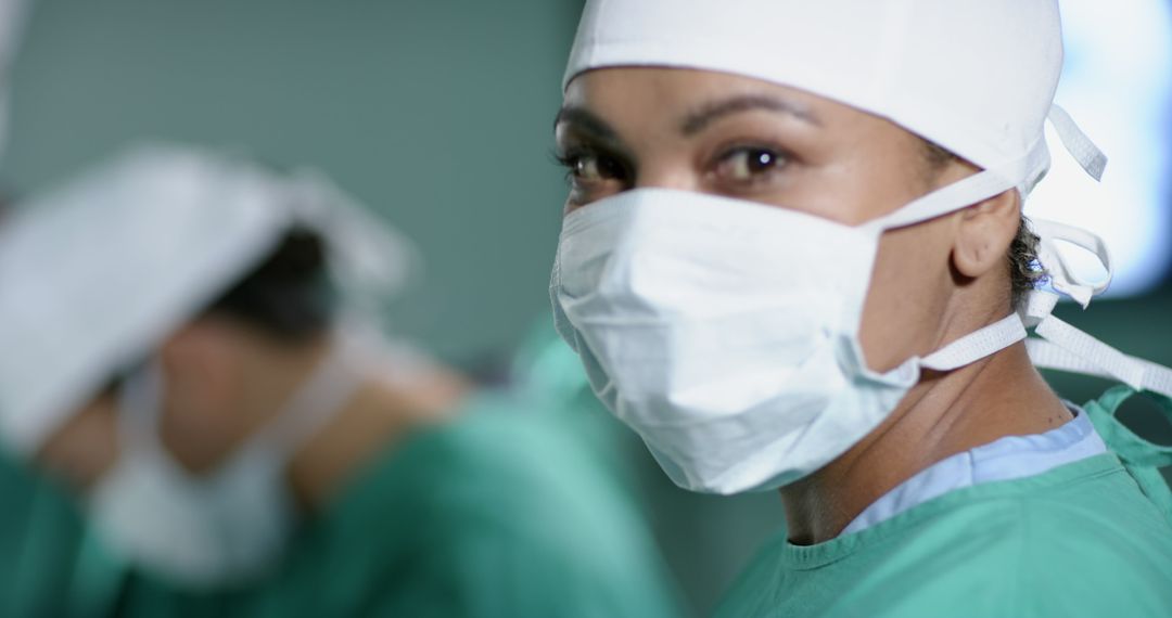 Focused Female Surgeon in Operating Room - Free Images, Stock Photos and Pictures on Pikwizard.com