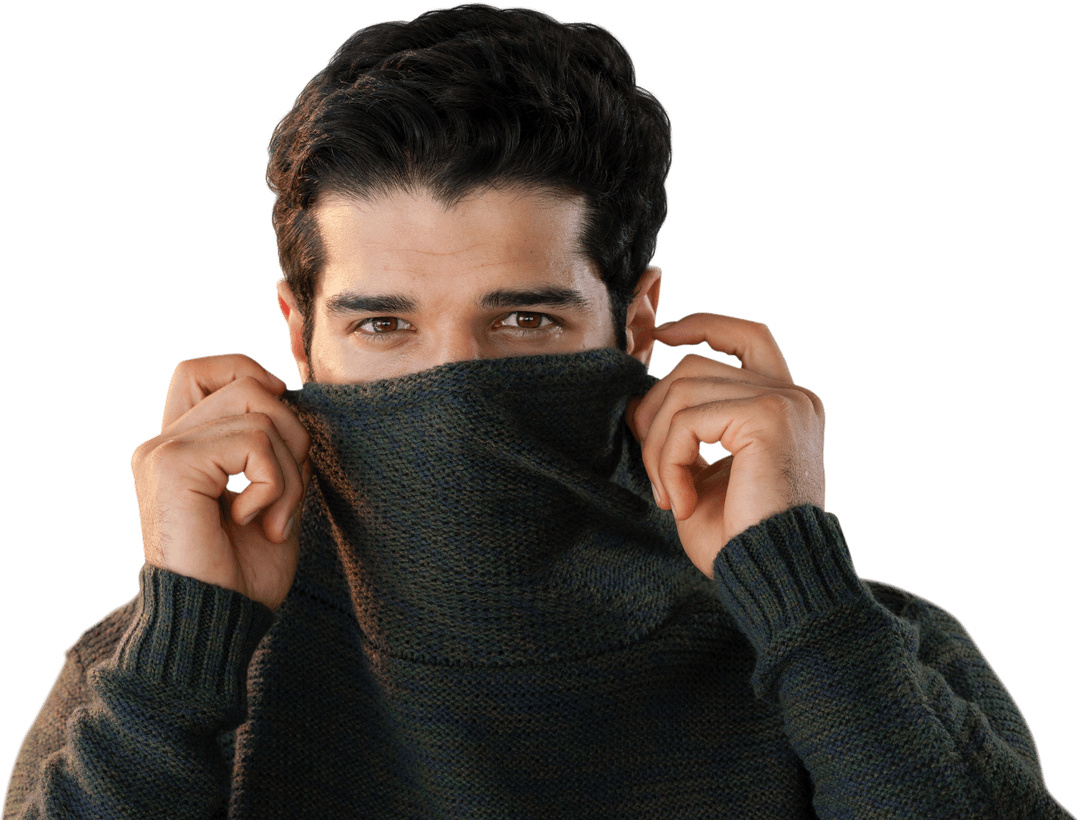 Man Playfully Hiding Behind Green Sweater Eating Transparent Chocolate Bar