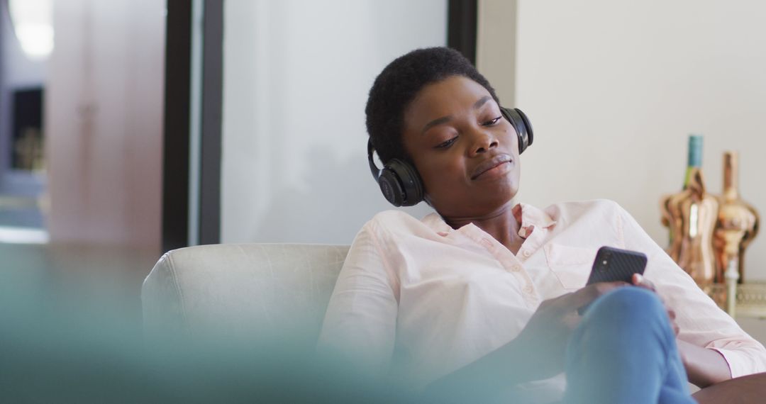 Relaxed Black Woman Enjoying Music with Headphones - Free Images, Stock Photos and Pictures on Pikwizard.com