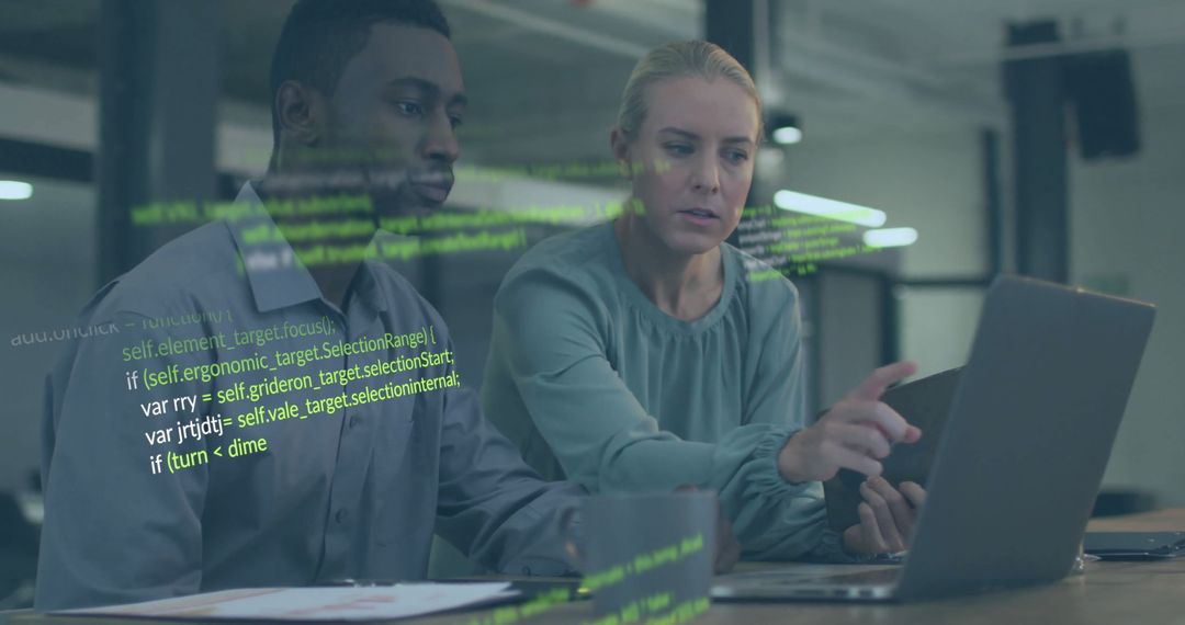 Diverse Colleagues Analyzing Data Overlaid with Code Indoors