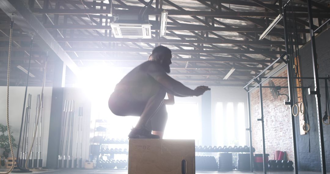 Solid Box Jump Workout in Modern CrossFit Gym, Boosting Fitness and Agility