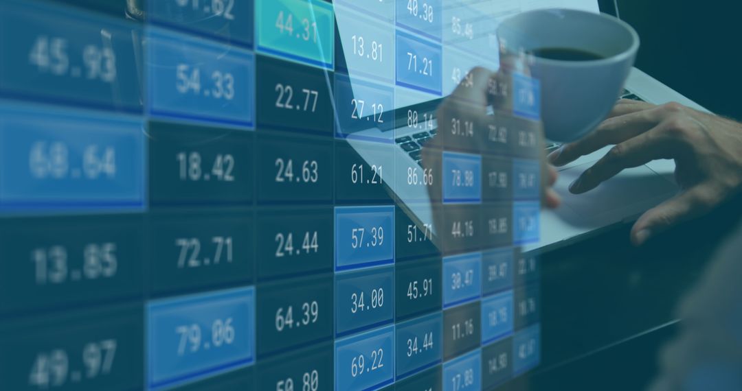 Businesswoman Analyzing Data on Laptop with Coffee