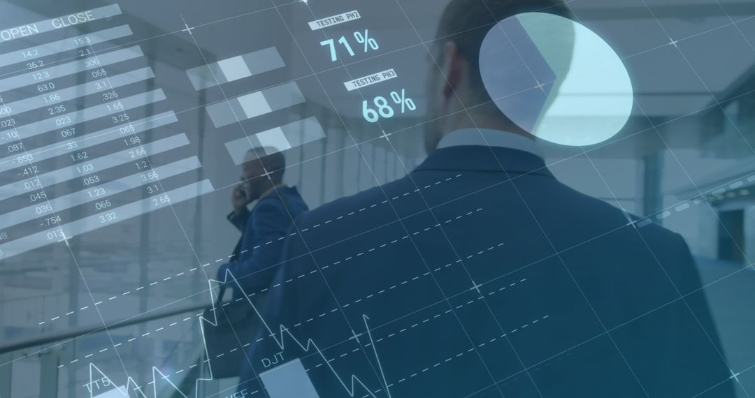 Business Professionals Analyzing Digital Interface and Graphs