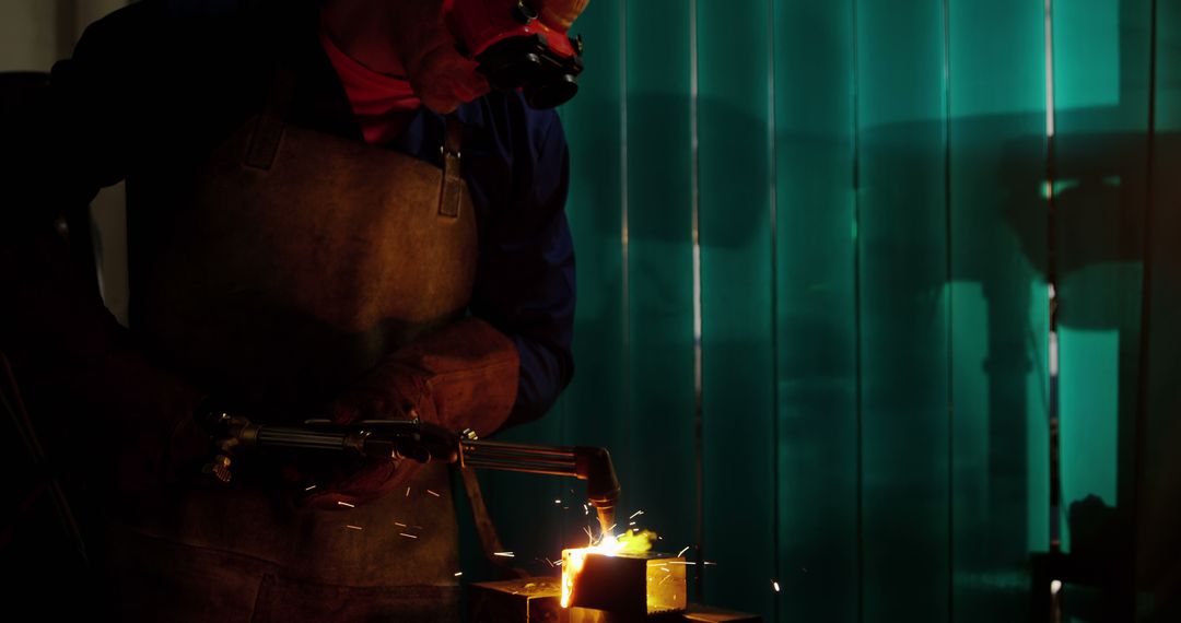 Metalworker Welding with Protective Gear in Workshop - Free Images, Stock Photos and Pictures on Pikwizard.com