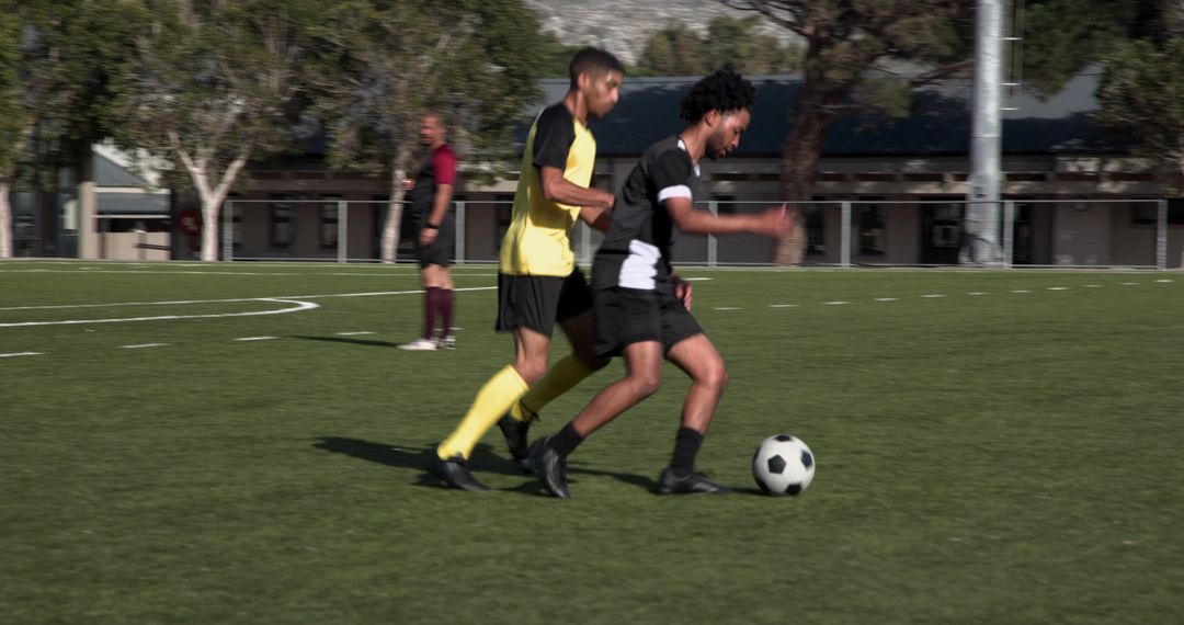 Soccer Match Players Competing with Intense Focus
