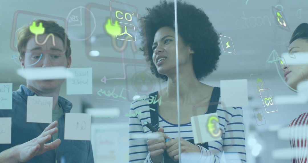 Team Collaborating on Digital Strategy with Glass Interface