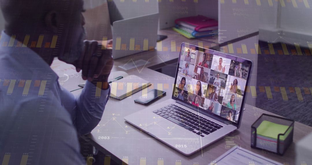 Professional Analyzing Virtual Meeting on Laptop in Office Setting