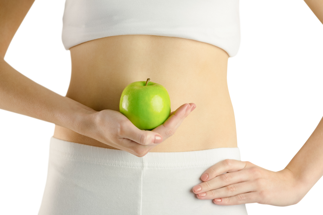 Transparent slim woman's midriff holding green apple in white garment - Download Free Stock Images Pikwizard.com