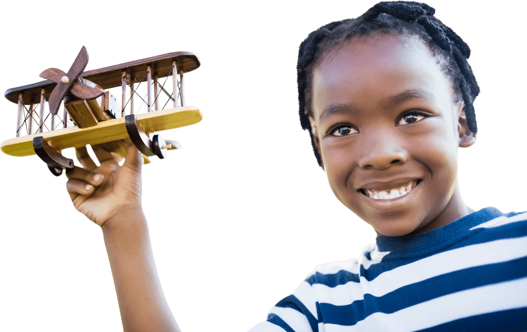 Cheerful Child Enjoying Playing with Vintage Toy Airplane Transparent Background