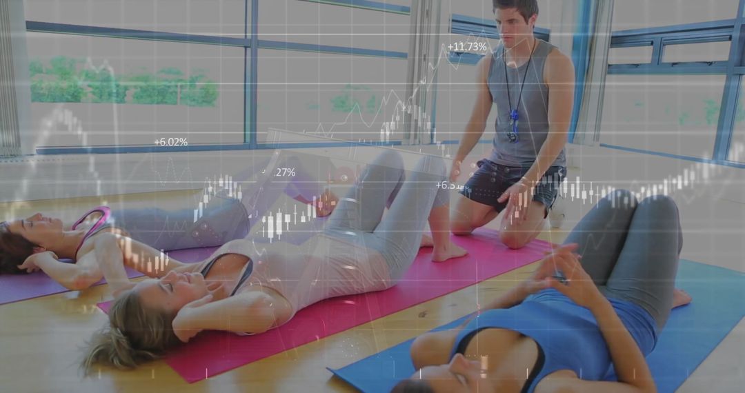 Women Performing Crunches in Studio with Trainer Overlaid with Graph