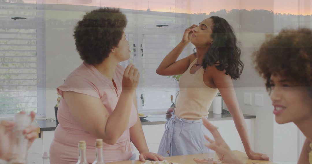 Friends Exploring Wine Aromas Enjoying Charcuterie in Modern Kitchen