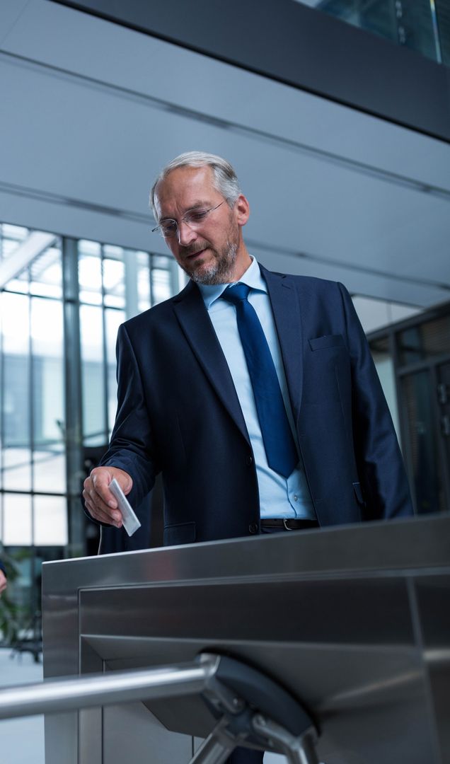 Business Executive Using Access Card to Enter Office Building