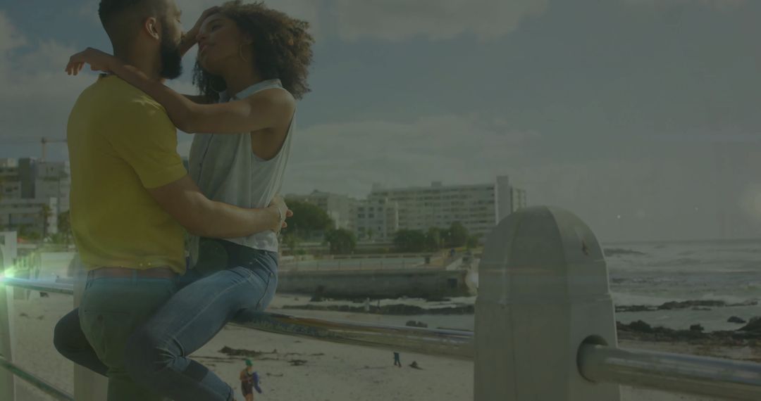 Couple Embracing on Seaside Promenade By Ocean View