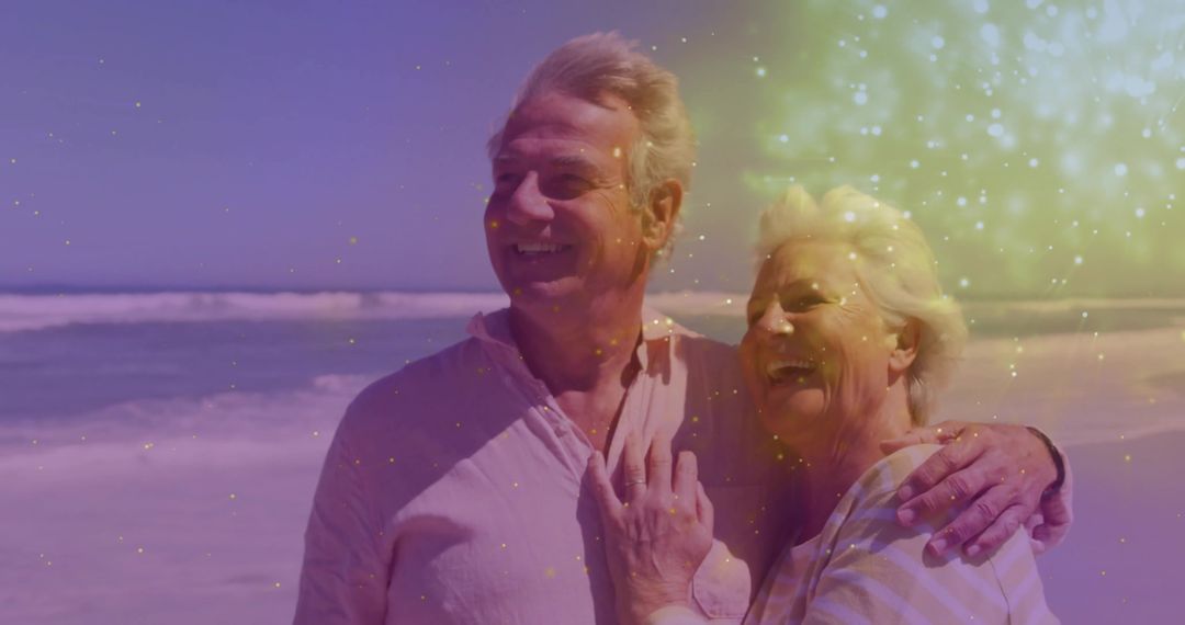 Senior Couple Enjoying Serene Beach Moment with Smiles and Laughter
