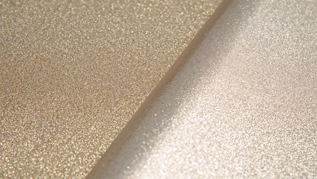 Gleaming Gold and Champagne Glitter Sheets Meeting at Diagonal Seam