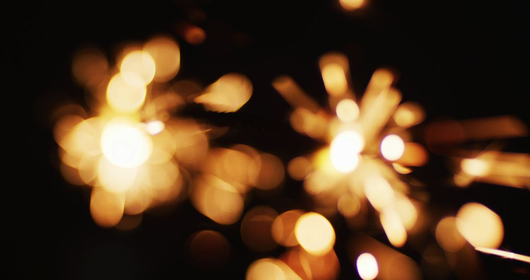 Blurred Sparklers on Dark Background, Festive Celebration Concept