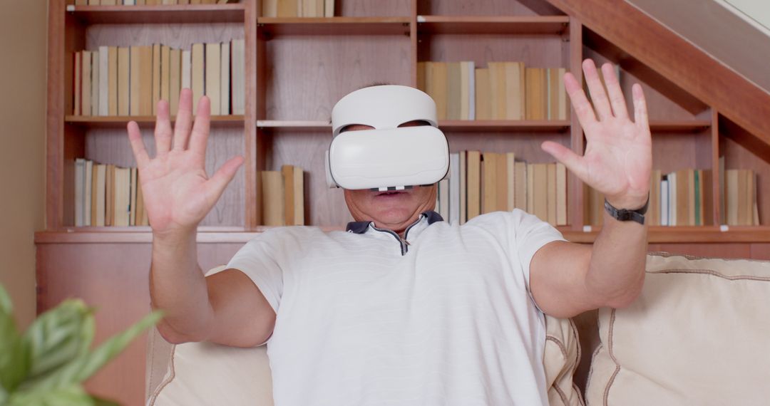 Middle-Aged Man Engaging With Virtual Reality in Home Office Environment