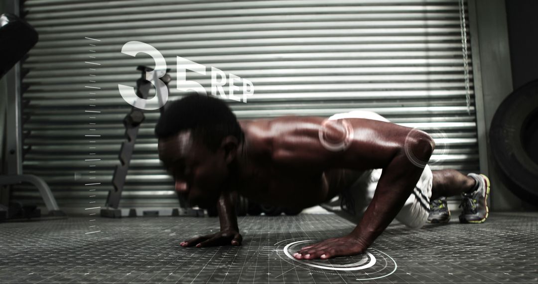 Fit Man Exercising with Push-Ups in Modern Gym - Free Images, Stock Photos and Pictures on Pikwizard.com