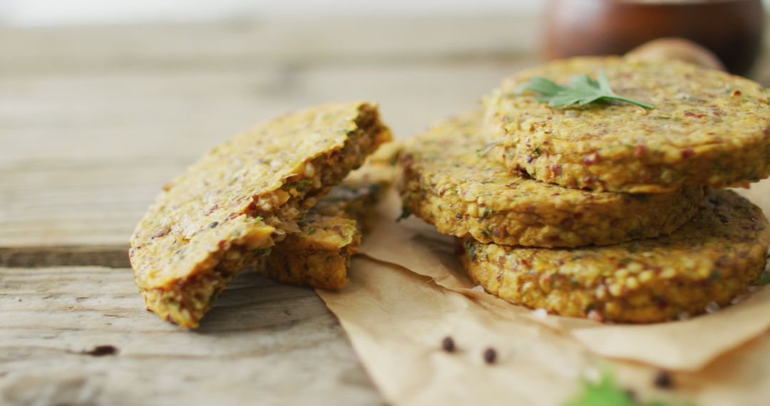 Healthy Vegan Quinoa Patties Stacked on Rustic Wooden Table - Free Images, Stock Photos and Pictures on Pikwizard.com