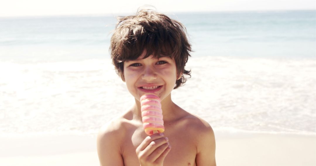 Joyful Child Enjoying Ice Cream by the Ocean