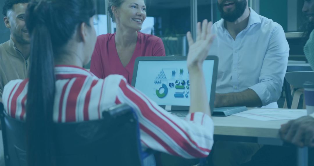 Diverse Office Colleagues Reviewing Financial Data