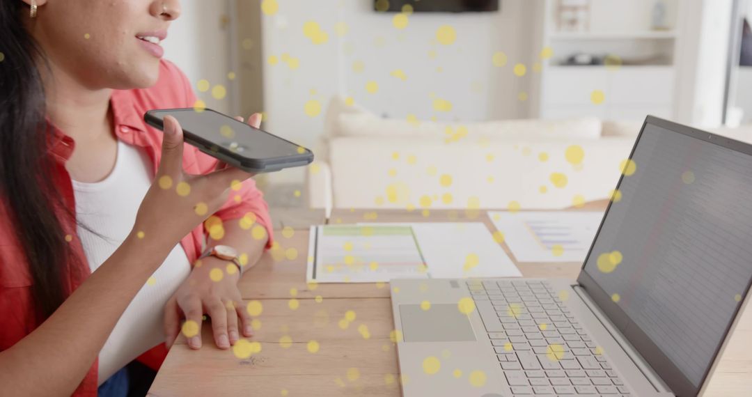 Woman Using Voice Assistant on Smartphone in Home Office