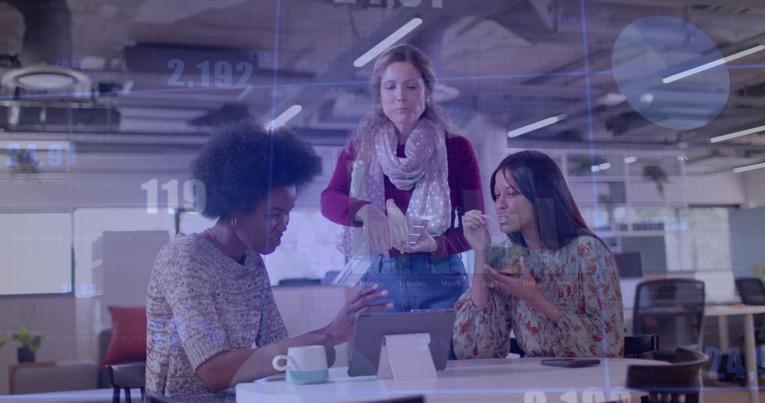 Diverse Team Collaborating in Modern Office with Financial Projections