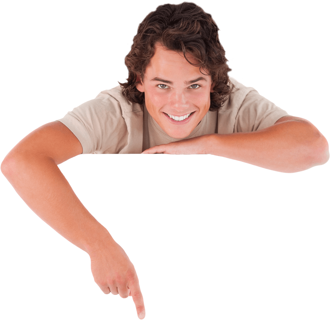 Smiling Young Man Pointing at Blank Transparent Space for Text