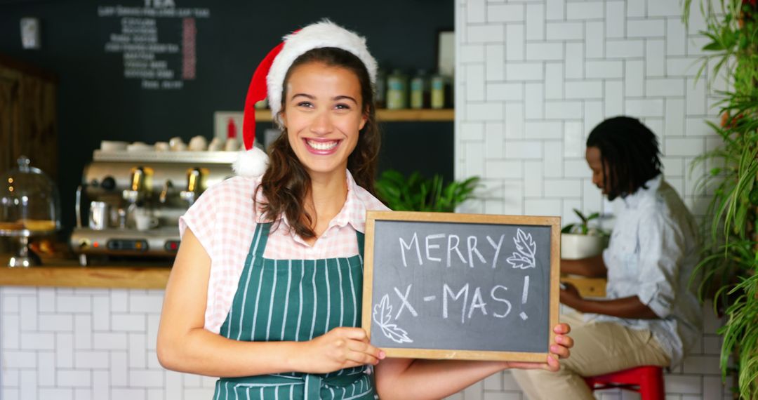 Smiling Barista Wishing Merry X-Mas - Free Images, Stock Photos and Pictures on Pikwizard.com