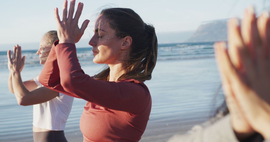 Women Practicing Yoga Meditation on Beach - Free Images, Stock Photos and Pictures on Pikwizard.com