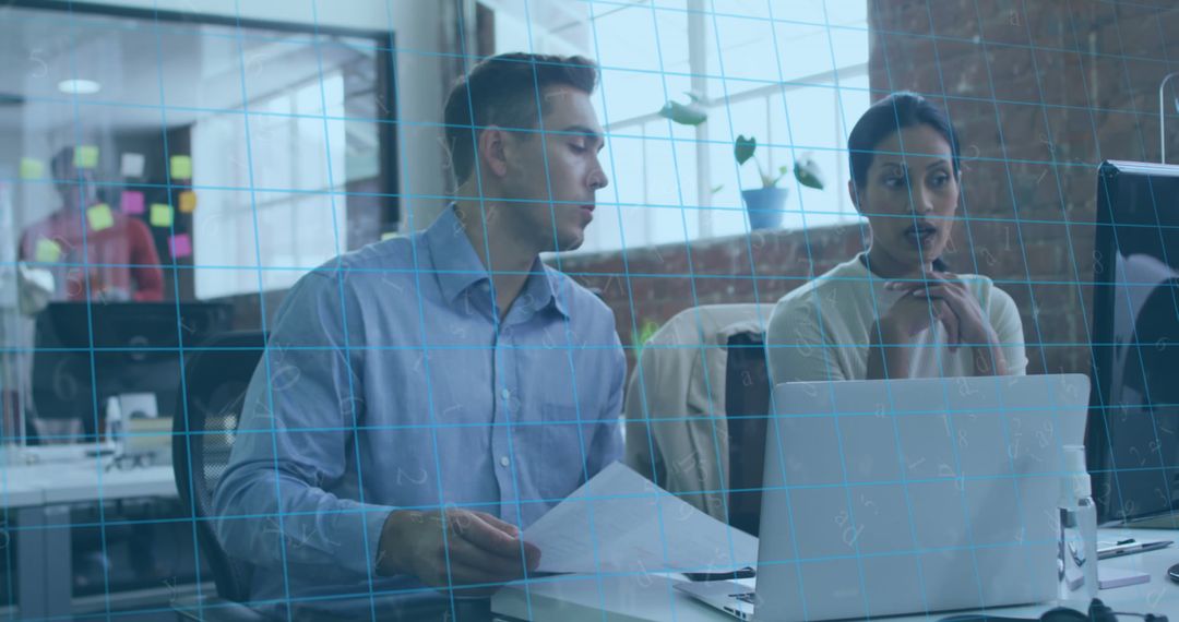 Colleagues Collaborating on Project in Modern Office with Tech Overlay