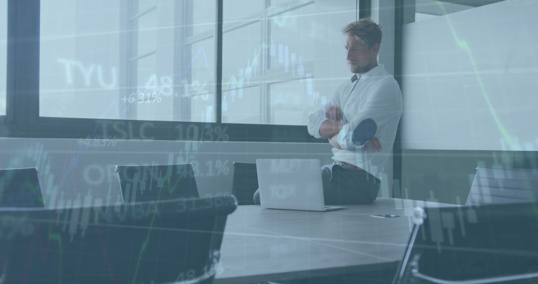 Businessman Analyzing Financial Data Patterns on Laptop