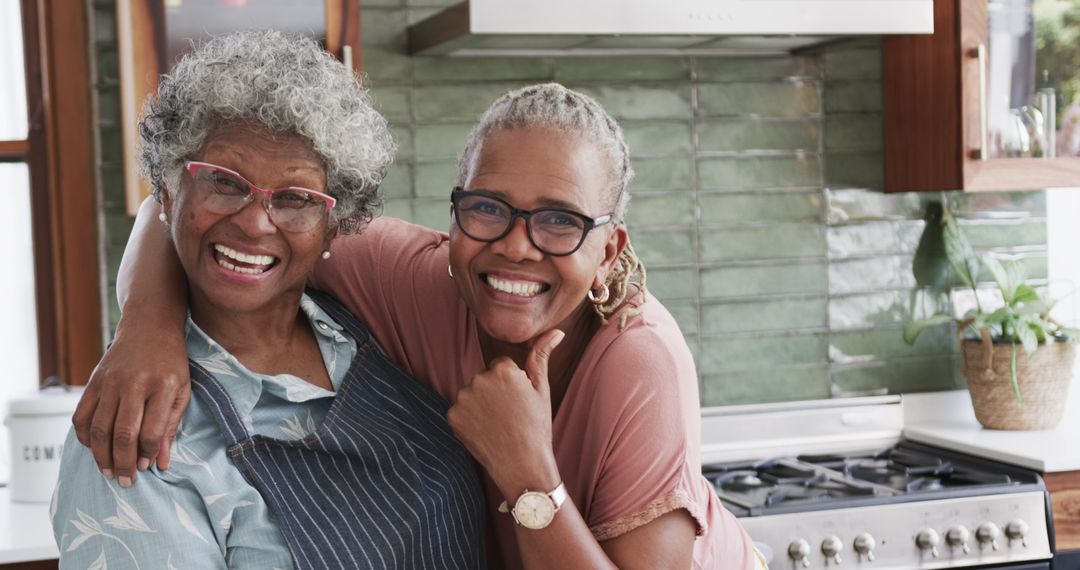 Smiling Senior Women Spending Quality Time in Kitchen
