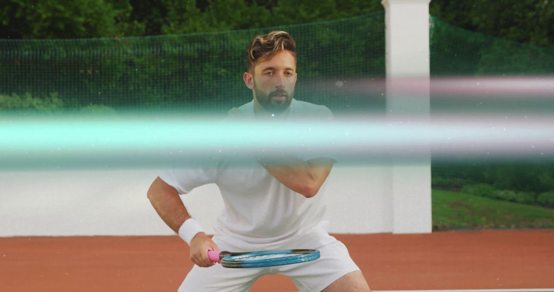 Dynamic Tennis Player Keeps Eye on Ball Amid Fierce Match