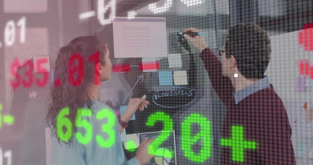 Business Team Analyzing Financial Data in Modern Office Setup