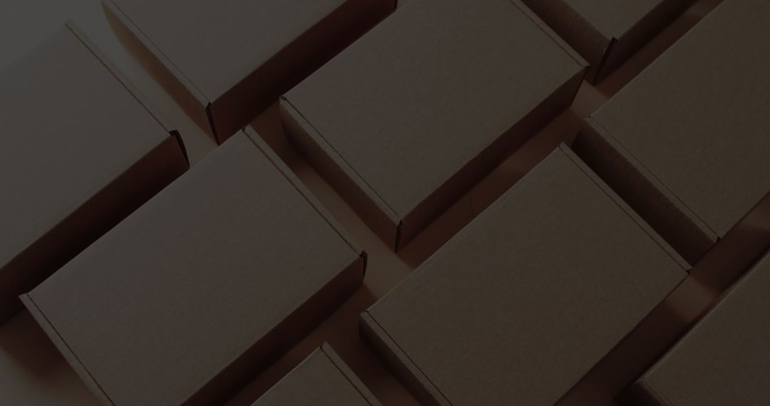 Neatly Arranged Brown Cardboard Boxes on Surface
