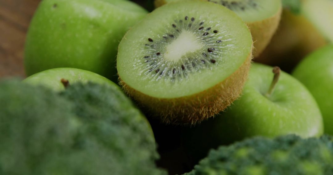 Fresh Kiwi Halves with Green Apples and Broccoli