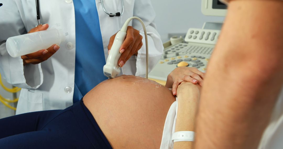 Doctor Performing Ultrasound on Pregnant Woman’s Belly - Free Images, Stock Photos and Pictures on Pikwizard.com