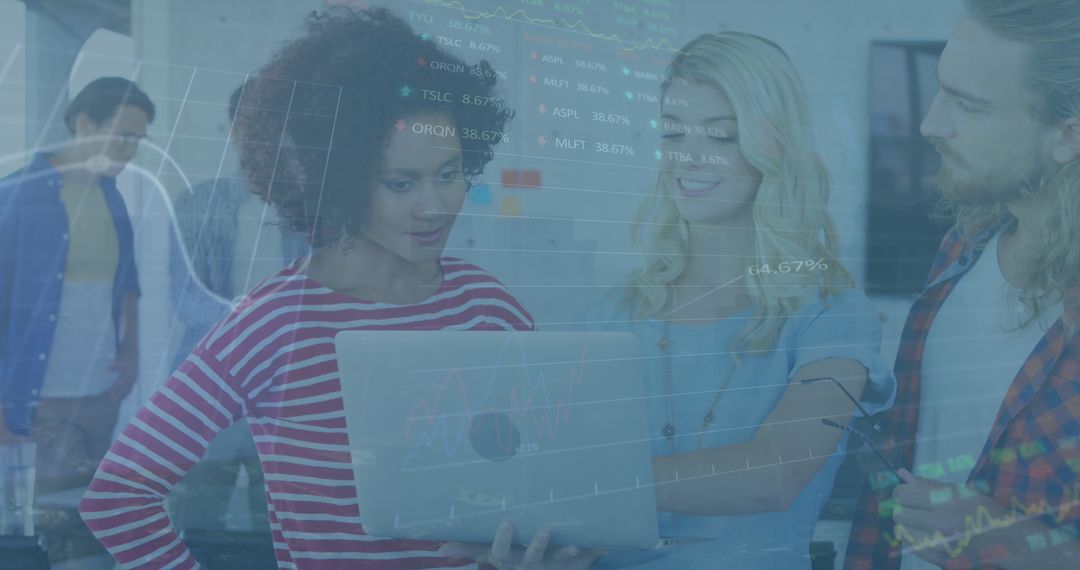 Diverse Group Collaborating on Financial Technology in Office