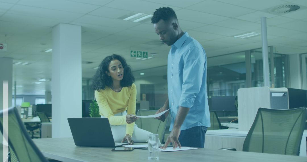 Business Team Analyzing Financial Data at Modern Workspace