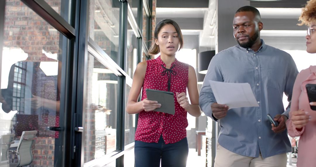 Collaborative Business Discussion in Modern Office Environment