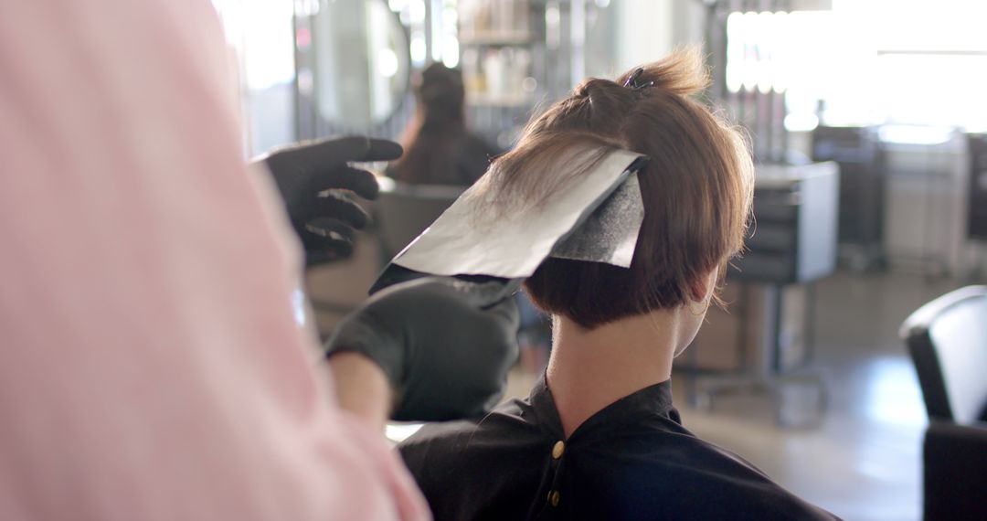 Hairdresser Applying Highlights in Modern Salon - Free Images, Stock Photos and Pictures on Pikwizard.com