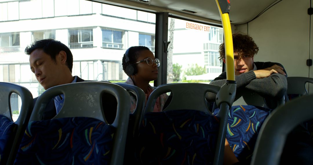 Commuters on Public Bus Traveling in Daylight - Free Images, Stock Photos and Pictures on Pikwizard.com