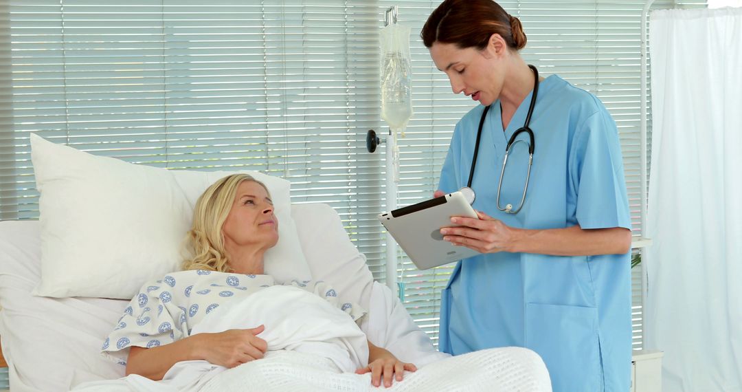 Nurse caring for hospitalized patient in hospital room - Free Images, Stock Photos and Pictures on Pikwizard.com