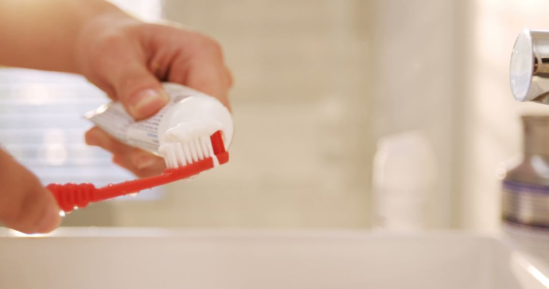 Man putting toothpaste on toothbrush in bathroom at home 4k - Free Images, Stock Photos and Pictures on Pikwizard.com