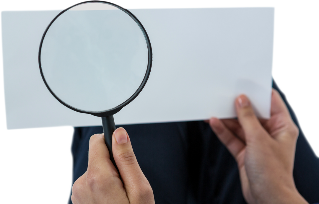 Close-up of Hands Holding Magnifying Glass and Transparent Paper - Download Free Stock Images Pikwizard.com